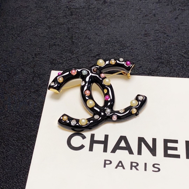 Ch**el brooches